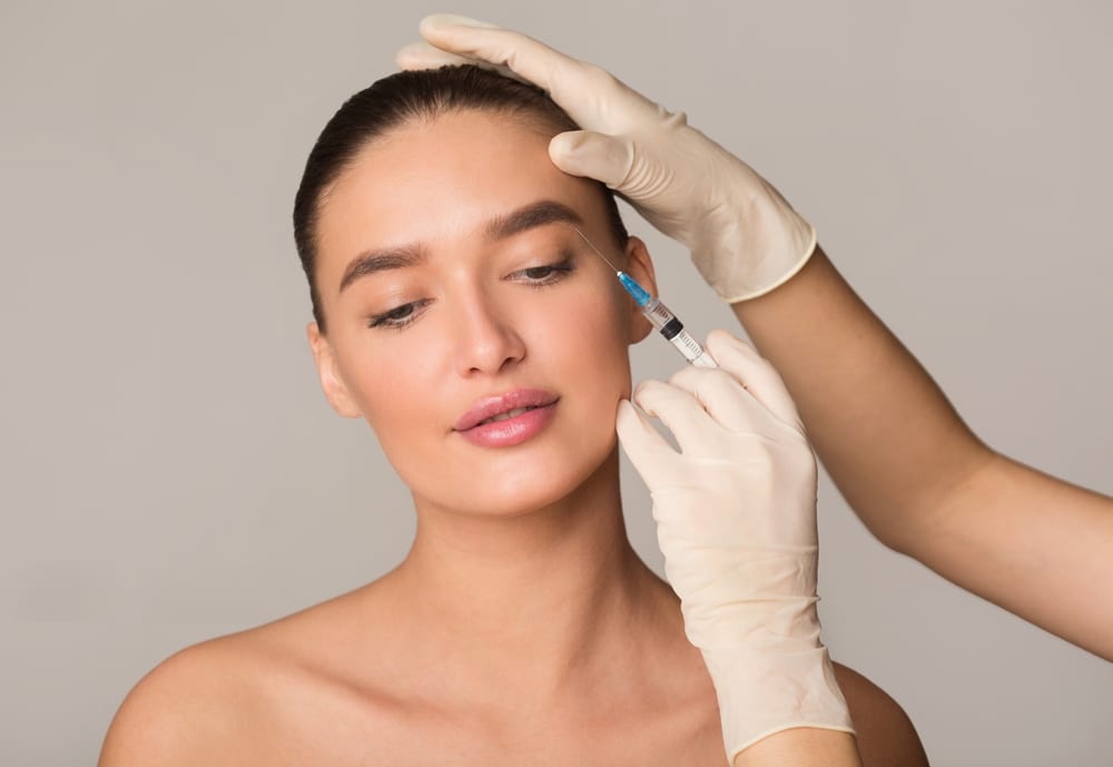 Plastic,Surgery,And,Beauty,Injection,Concept.,Young,Woman,Receiving,Botox