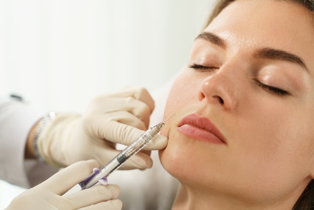 Female,Client,During,Facial,Filler,Injections,In,Aesthetic,Medical,Clinic